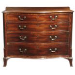 A George III mahogany and satinwood serpentine chest attributed to Gillows, the plum pudding top