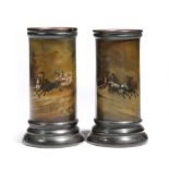 A matched pair of late 19th century Russian black lacquer papier-mache spill vases by Vishniakov,