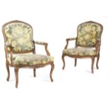 A pair of Louis XV style beechwood fauteuil a la reine, each with a padded back, seat and