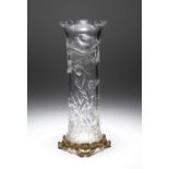 A French cylindrical glass vase in the manner of Baccarat, the petal rim above a body cut with