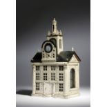 A Russian bone model of a railway station, the tower with a bell above an ebonised roof and with a