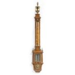 An early 18th century style burr walnut and brass mounted siphon-tube barometer after Thomas