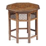 λ An Anglo-Indian hardwood octagonal occasional table, inlaid with amber stained bone and ivory,
