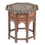 An Anglo-Indian hardwood octagonal occasional table, inlaid with bone with scrolling flowers and