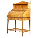 λ AMENDED A George III satinwood cylinder bureau by Gillows, with rosewood banding