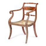 A Regency red lacquer open armchair, with parcel gilt decoration, the horizontal splat decorated