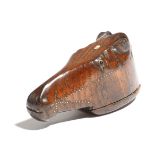 A 19th century treen snuff shoe in the form of a horse's head, with brass tack decoration and inlaid