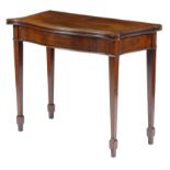 A George III mahogany serpentine card table, the hinged top inlaid with boxwood and ebonised