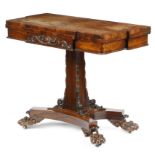 λ A William IV rosewood card table, the breakfront hinged and swivel top above a frieze carved with