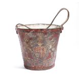 An early 19th century leather fire bucket, painted with the Royal Coat of Arms, on a red ground,