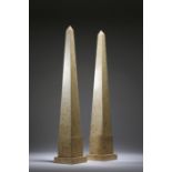 A pair of variegated marble obelisks of tapering form, 20th century, 58cm high. (2) Provenance:
