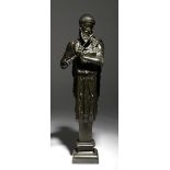 After the antique. A 19th century Italian bronze Grand Tour model of a Satyr herm, playing the