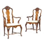 Two similar Dutch marquetry open armchairs, walnut and mahogany, each with a Rococo carved arched