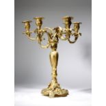 A 19th century French ormolu candelabrum in Louis XV style, in the manner of Meissonier, with a leaf