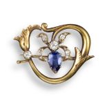 A sapphire and diamond-set Art Nouveau floral brooch by Fabergé, set with a pear-shaped sapphire and