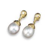 A pair of cultured pearl and diamond drop earrings, each round brilliant-cut diamond is set in