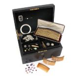 A jewellery casket with two lift-out trays containing various items of jewellery etc, including a