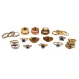 A mixed quantity of twenty six rings, including twelve plain gold rings, and eleven gem-set and