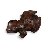 A carved hardstone frog, the sylised jasper frog with ruby cabochon eyes (one finger and two toes