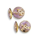 A pair of Japanese shell cameo cufflinks, the carved shell depicting flowers within a lozenge-shaped