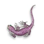 A gem-set gold lizard brooch, pave-set with rubies and with emerald eyes in white gold, 5cm long