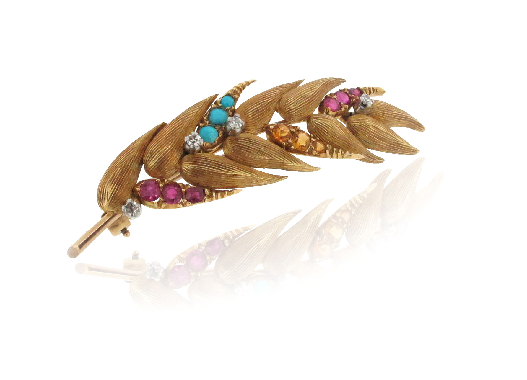 A gem-set gold wheatsheaf brooch, the stylised gold brooch set with diamonds, turquoise cabochons,