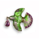 An enamel and ruby dove brooch by Child & Child, decorated with green enamel (damaged) and rubies