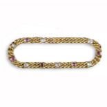 A French yellow gold curb-link bracelet, alternately-set with circular-cut rubies and diamonds in