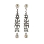 A pair of cultured pearl and diamond drop earrings, the modern cultured pearl studs suspend