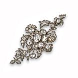 A late 19th century diamond foliate brooch, set overall with graduated cushion-shaped and oval-