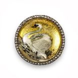 A late 19th century reverse carved crystal brooch, realistically depicting a swan within rose-cut