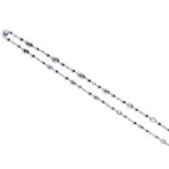 A long sapphire diamond and moonstone chain, alternately-set with cabochon moonstones, diamonds