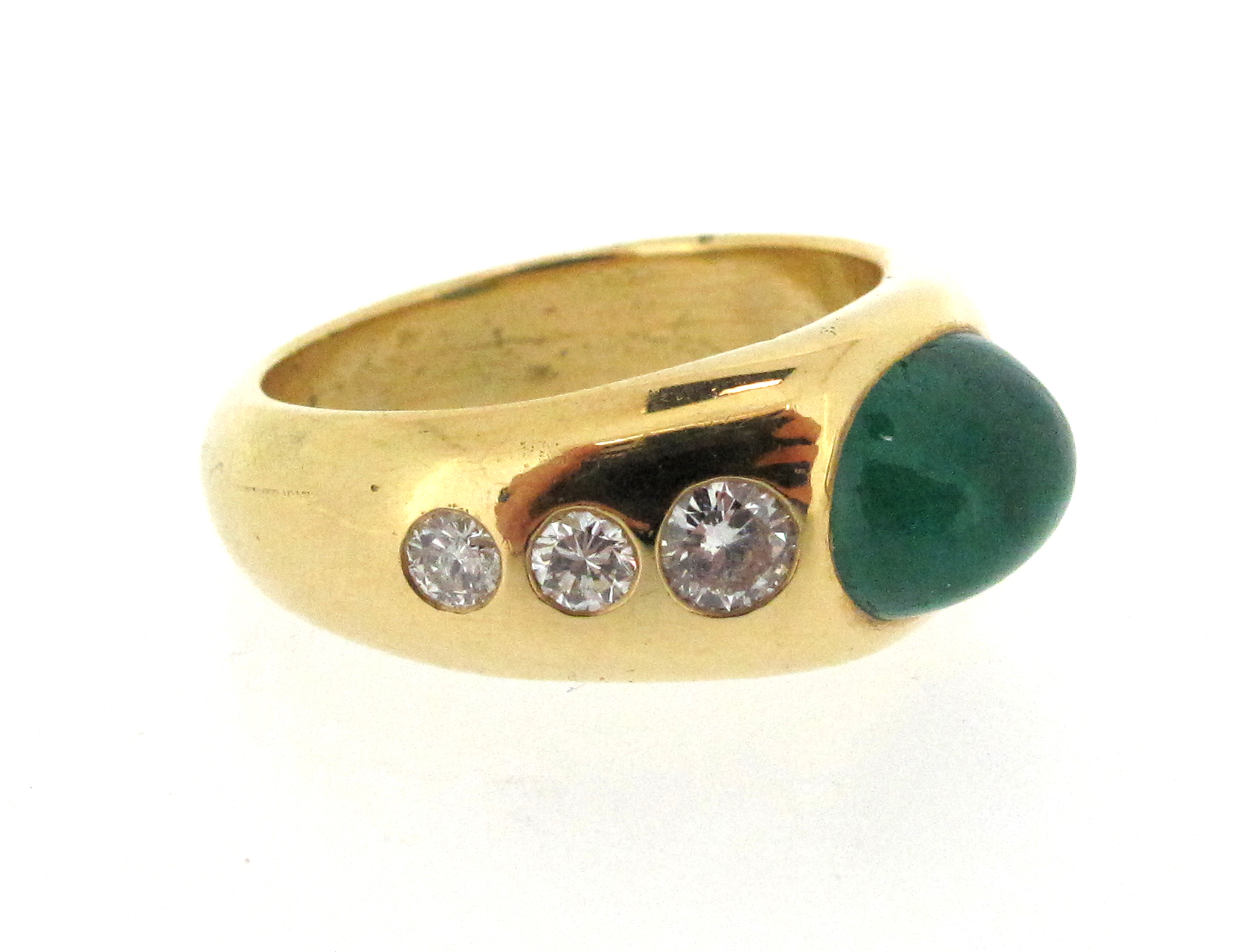 An emerald and diamond gypsy ring, set with an emerald cabochon and three graduated round - Image 2 of 4