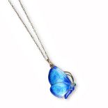 A silver and enamel butterfly pendant by Child & Child, the butterfly realistically designed with