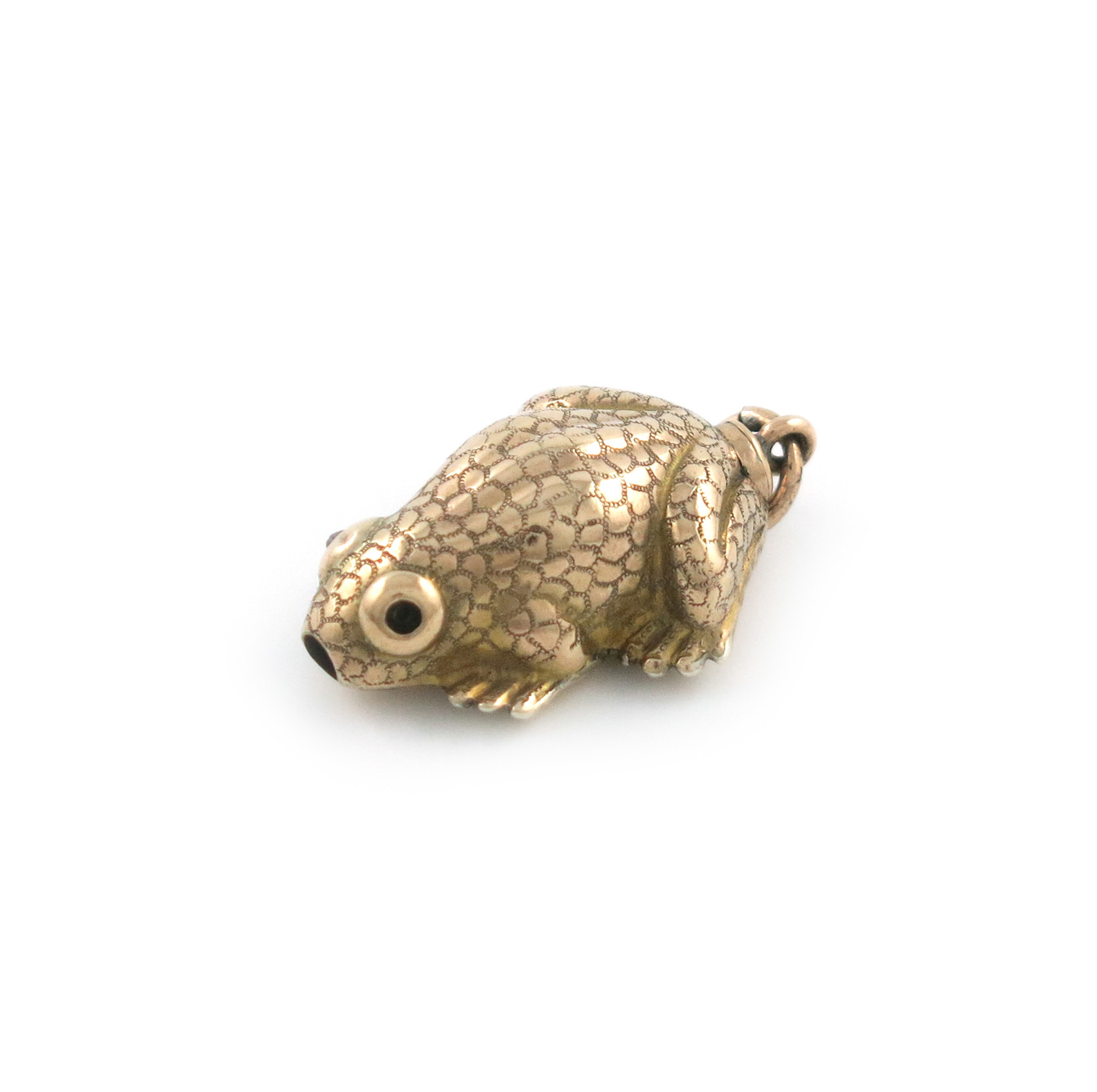 A rare Edwardian novelty gold pencil, unmarked, circa 1902, modelled as a frog, with gem set eyes,