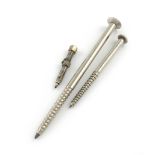 A small collection of three novelty base metal pencils, modelled as screws, comprising one inscribed