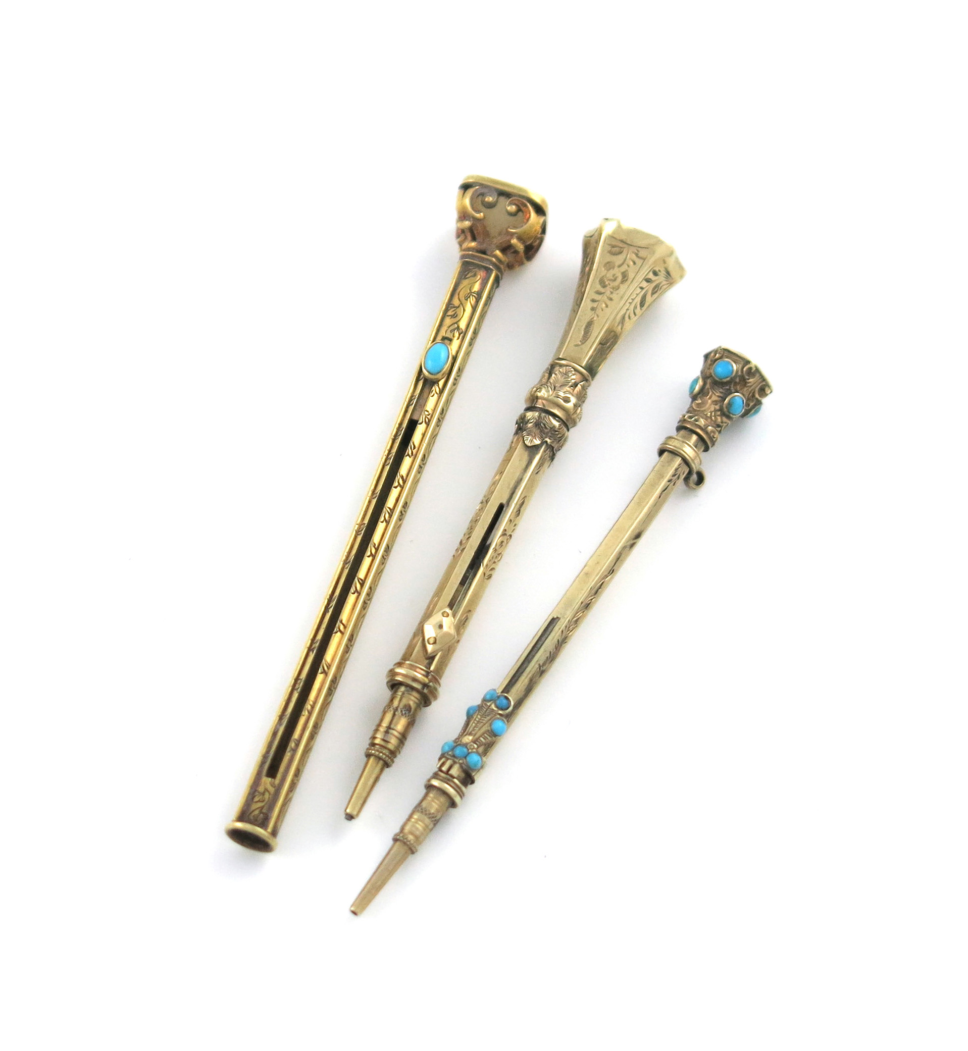 A Victorian gold Everpointed pencil, unmarked, faceted form, engraved decoration and set with