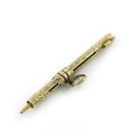 A Victorian novelty gold pencil, unmarked, one end with a pencil, the other with a key, with a