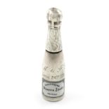 A Victorian novelty silver and enamel pencil, unmarked, modelled as champagne bottle, enamelled