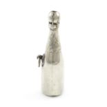 A novelty silver pencil, retailed by Hamilton and Co, Calcutta, modelled as champagne bottle, with a