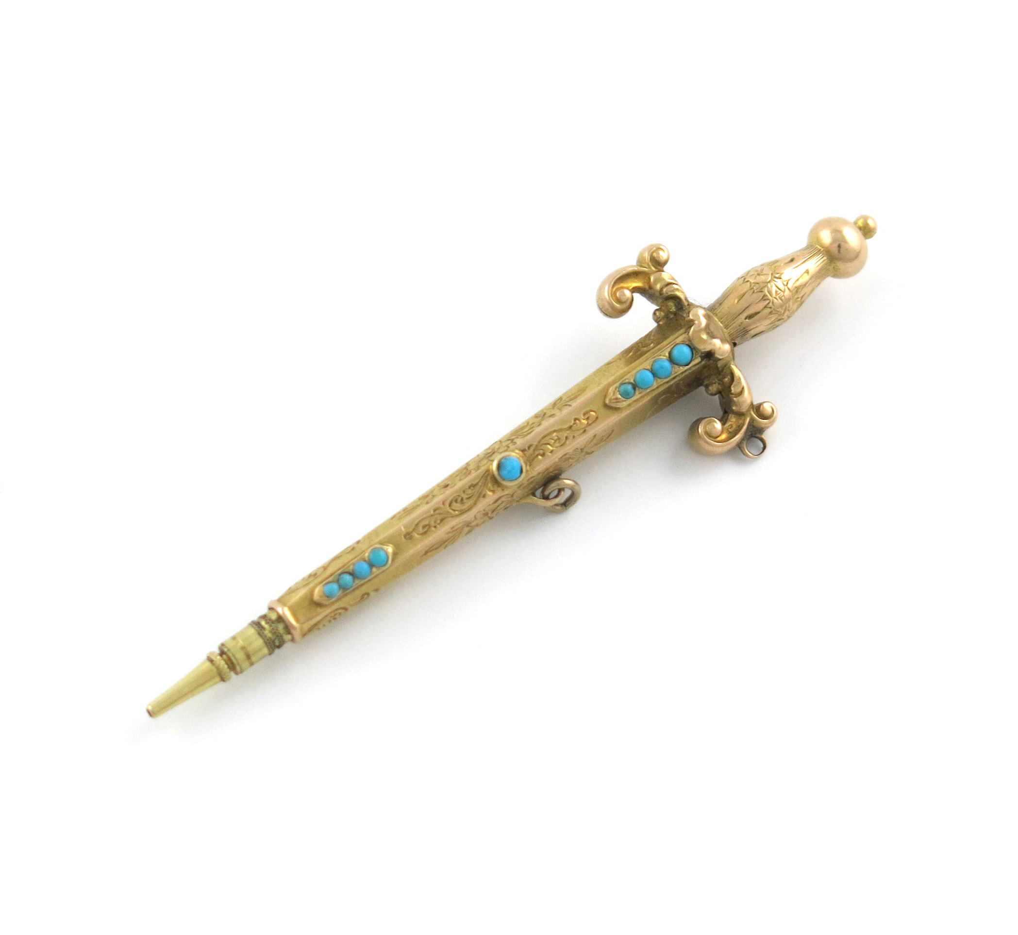 A Victorian novelty gold pencil, unmarked, modelled as a dagger, engraved decoration and set with