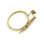 A Victorian gold bracelet sheath pencil, unmarked, the mount set with precious stones, with a