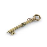 A Victorian novelty gold pencil, unmarked, modelled as a key, set with turquoise stones, and with