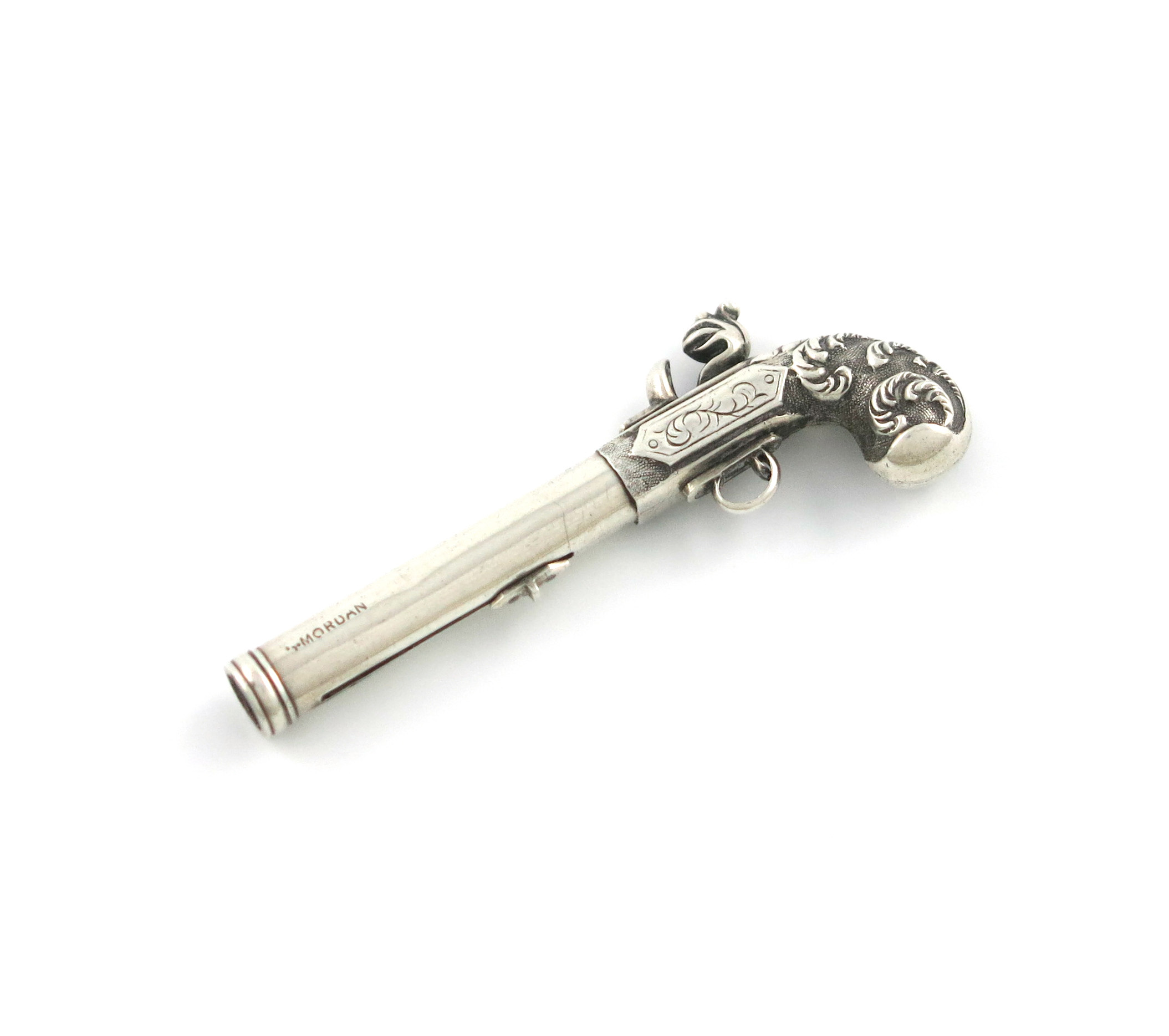 An early-Victorian novelty silver pencil, by S. Mordan, engraved July 6, 1840. modelled as a pistol,