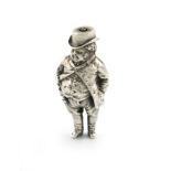 A Victorian novelty figural silver pencil, marked with a registration lozenge, modelled as a