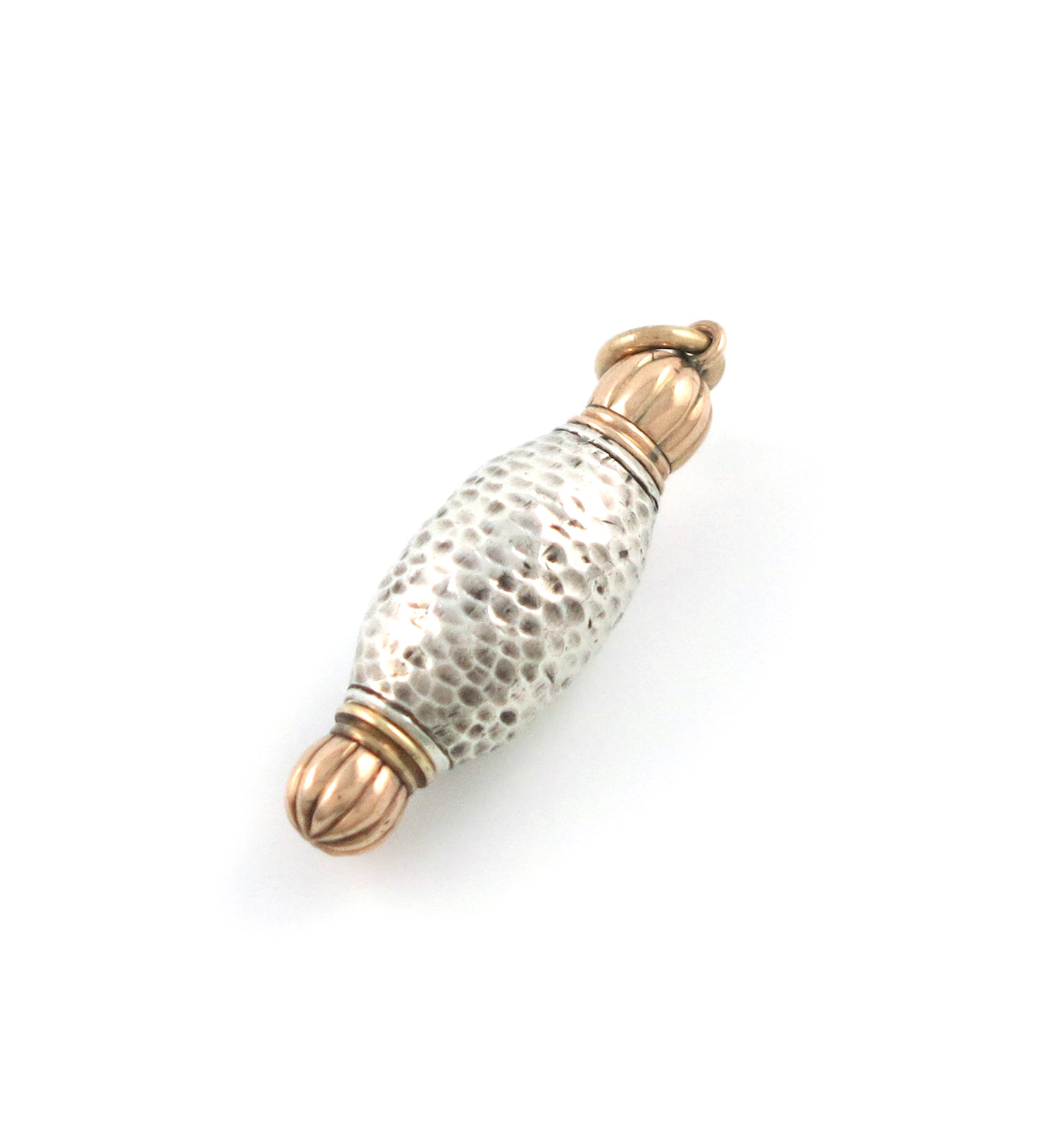A Victorian novelty silver and gold pencil, unmarked, modelled as a barrel, fluted ends, with a ring