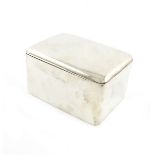 A large Edwardian silver cigarette box, by H. Mathews, Birmingham 1908,0 plain rectangular form,