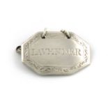 A 19th century silver boudoir label, unmarked, rectangular form, canted corners, engraved border,