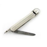 A silver combination pencil, whistle and penknife, unmarked, tapering oblong form, with a ring