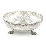 An Edwardian silver basket, by Elkington and Co, London 1904, circular form, pierced foliate